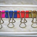 Hoeveel apparaten per huishouden bevatten metaal?